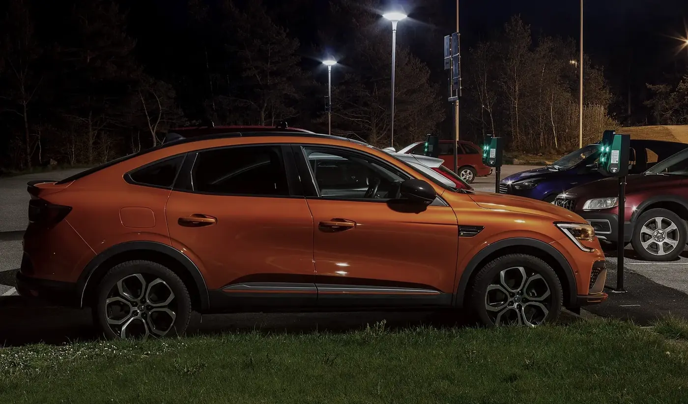 Electric car charging at night