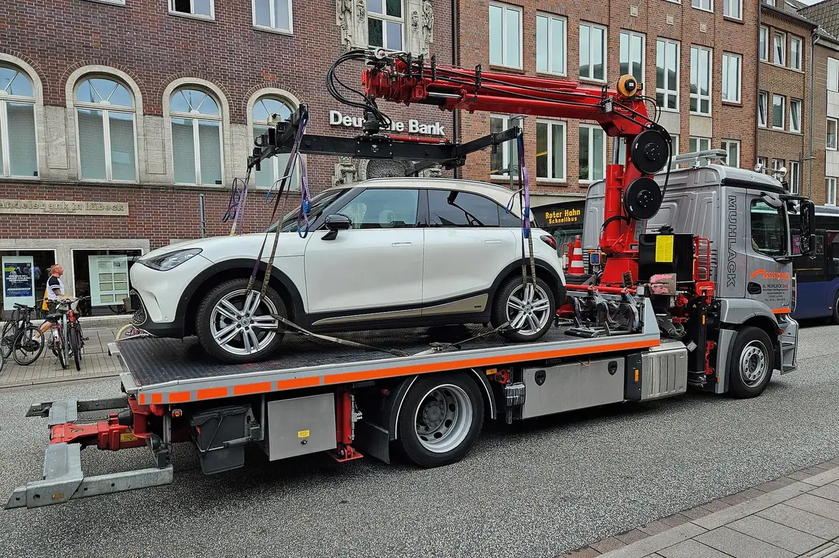 Flatbed tow truck ready to load a vehicle